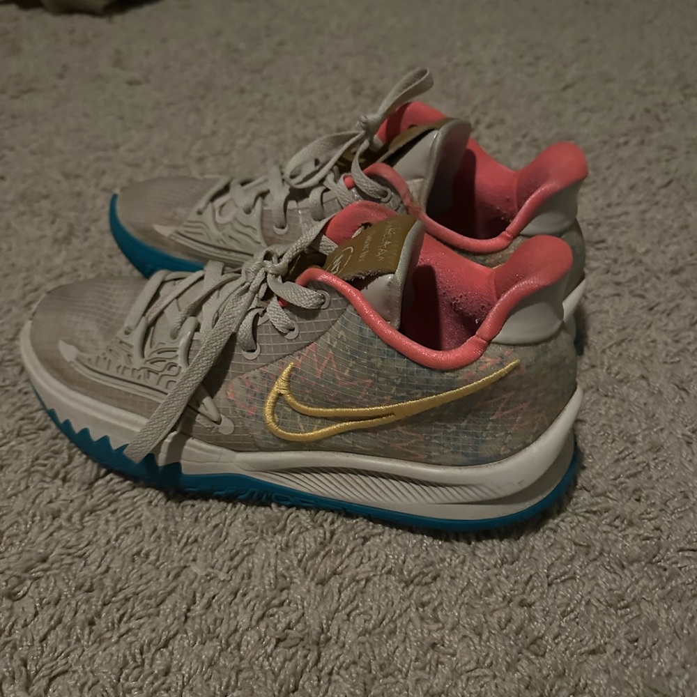 Nike Kyrie Shoes with Gold and Pink Highlights